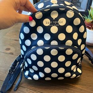 Super cute backpack purse. Very spacious